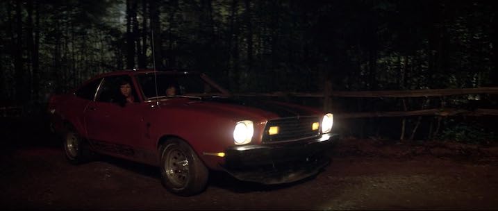 The red Ford Mustang driven by Jeff Bridges and Karen Allen in Starman during their road trip. NOTE: Stills shown are for promotional use only and not from the 4K UHD.