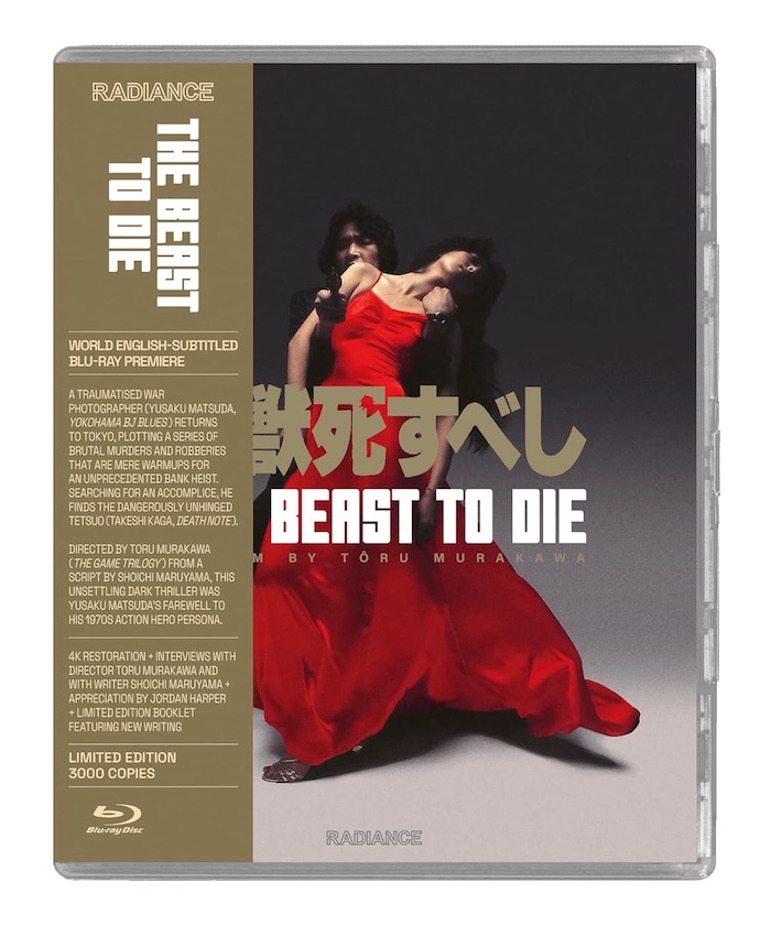 Front cover of Radiance Films’ Blu-ray edition of The Beast To Die, showing a man in black holding a woman in a red dress. Gold side strip highlights the film's English-subtitled premiere and special features.
