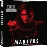 A close-up of the Eureka! 4K UHD slipcover for Martyrs, featuring a woman partially obscured by shadow with one side of her face and body torn, chained in front of a stark red background.