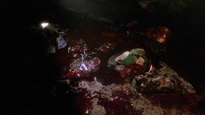 Bloody aftermath scene with broken equipment and gore from Shadowzone.
